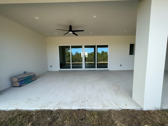 Patio glass sliding doors in rear of home